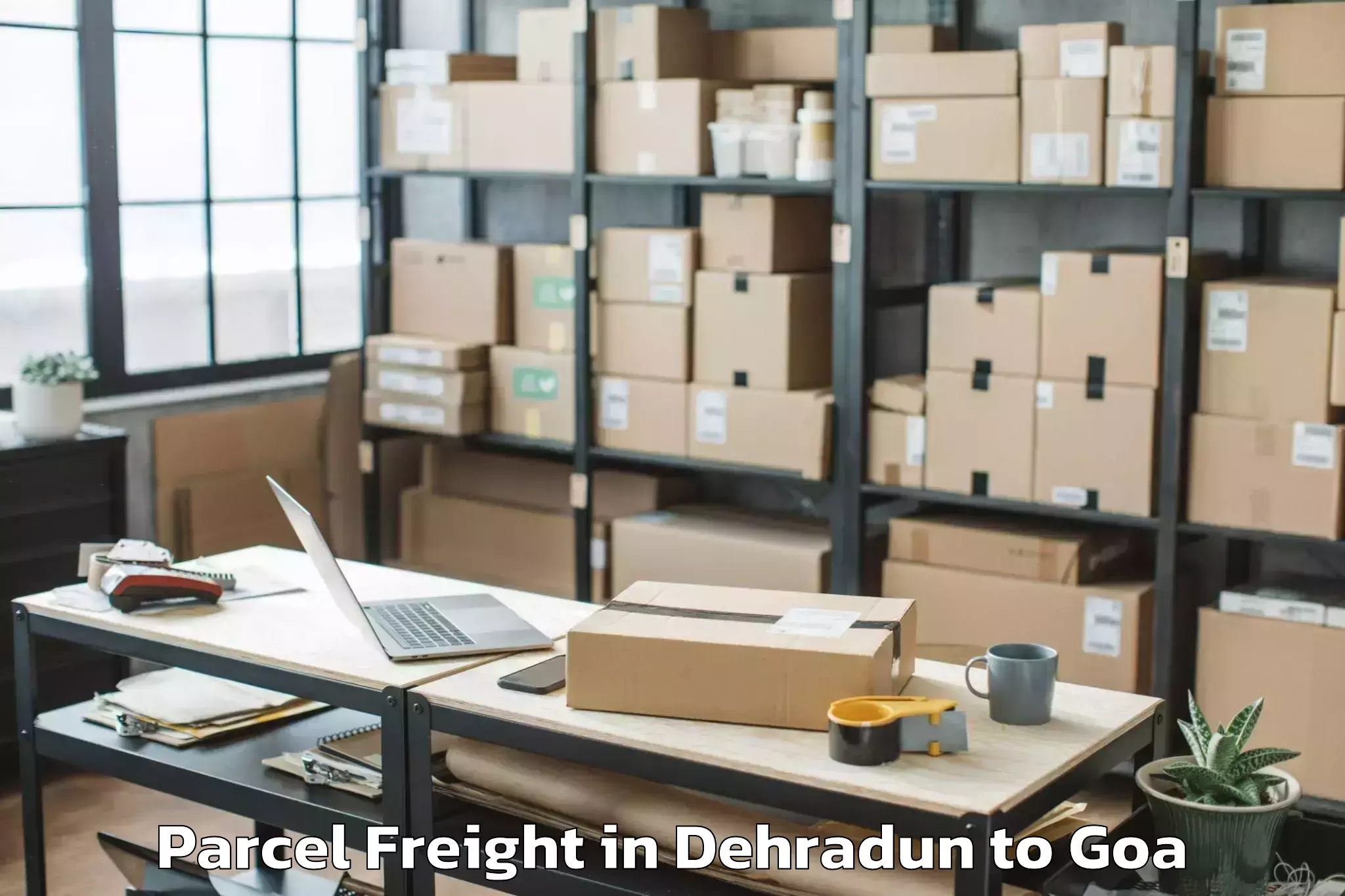 Book Dehradun to Davorlim Parcel Freight Online